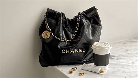 chanel rolling luggage|chanel 22 bag small.